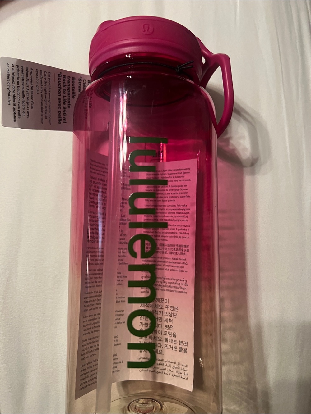 Back to Life Pink Clear Water Bottle with green wordmark